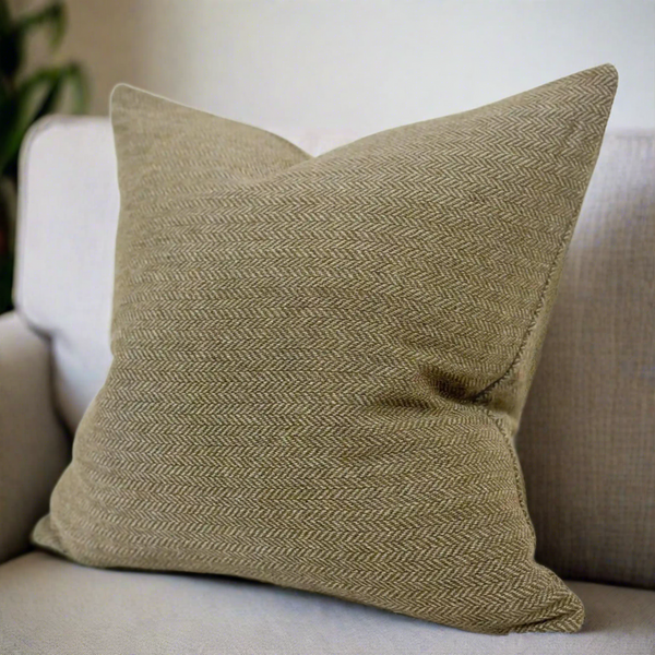 Square olive green wool effect cushion with a subtle herringbone pattern
