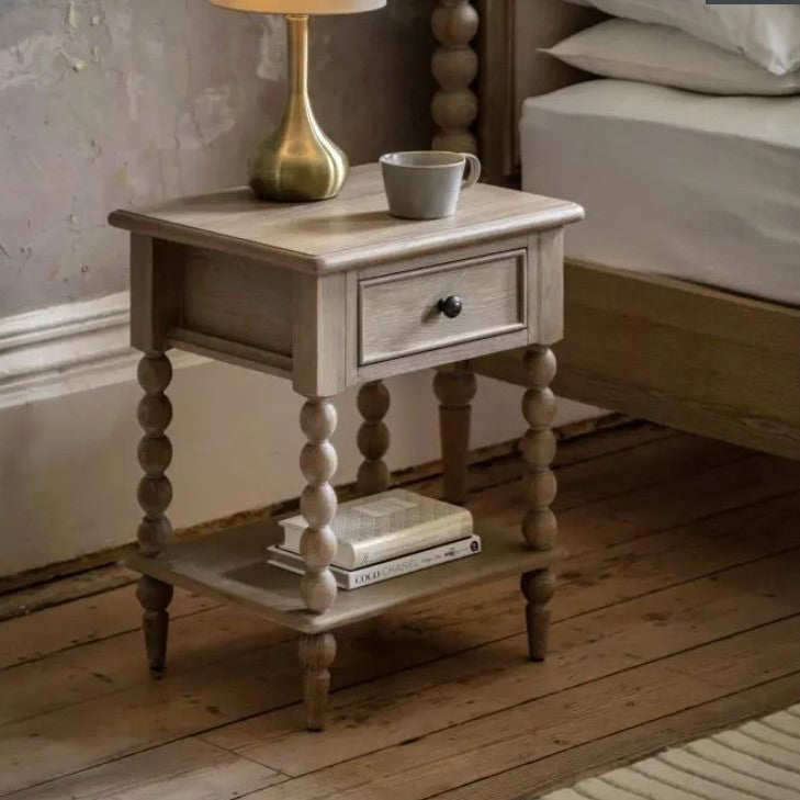 Oak bedside table with bobble legs and 1 drawer at top and 1 shelf at the bottom