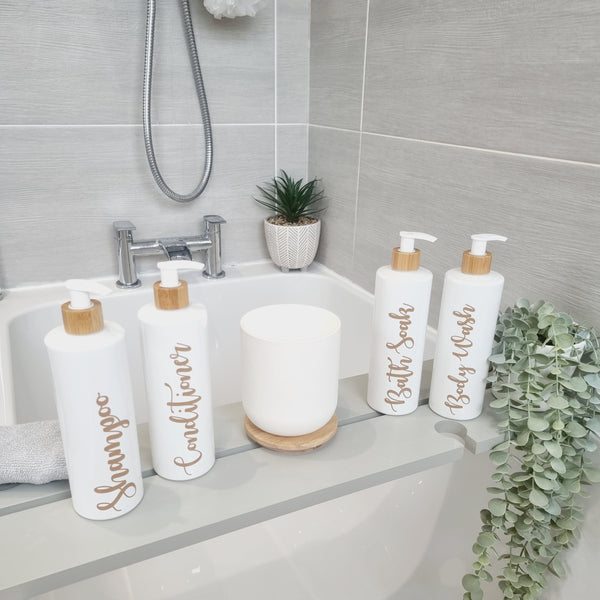 Four 500ml white and bamboo dispenser bottles with customisable wording for shampoo conditioner body wash and bath soak