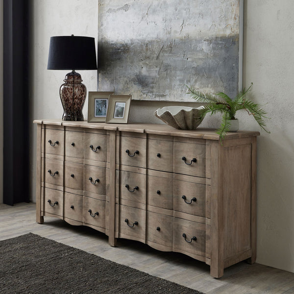 wooden bleach washed 6 drawer chest of drawers, with black metal handles. With a french country inspired design