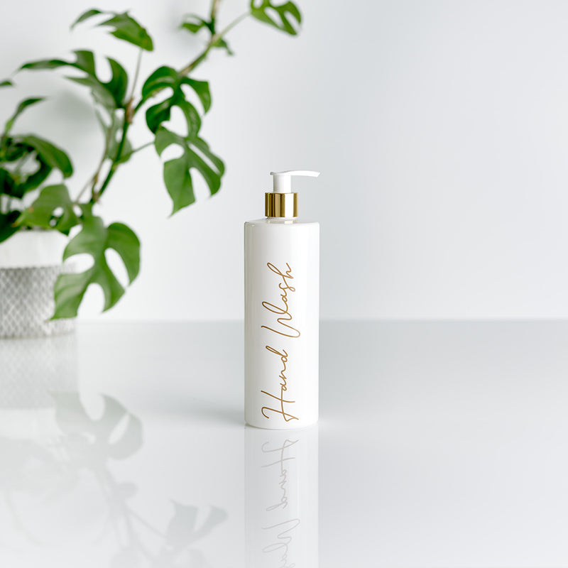a single white and gold pump dispenser bottle with gold custom personalised wording for Hand Wash