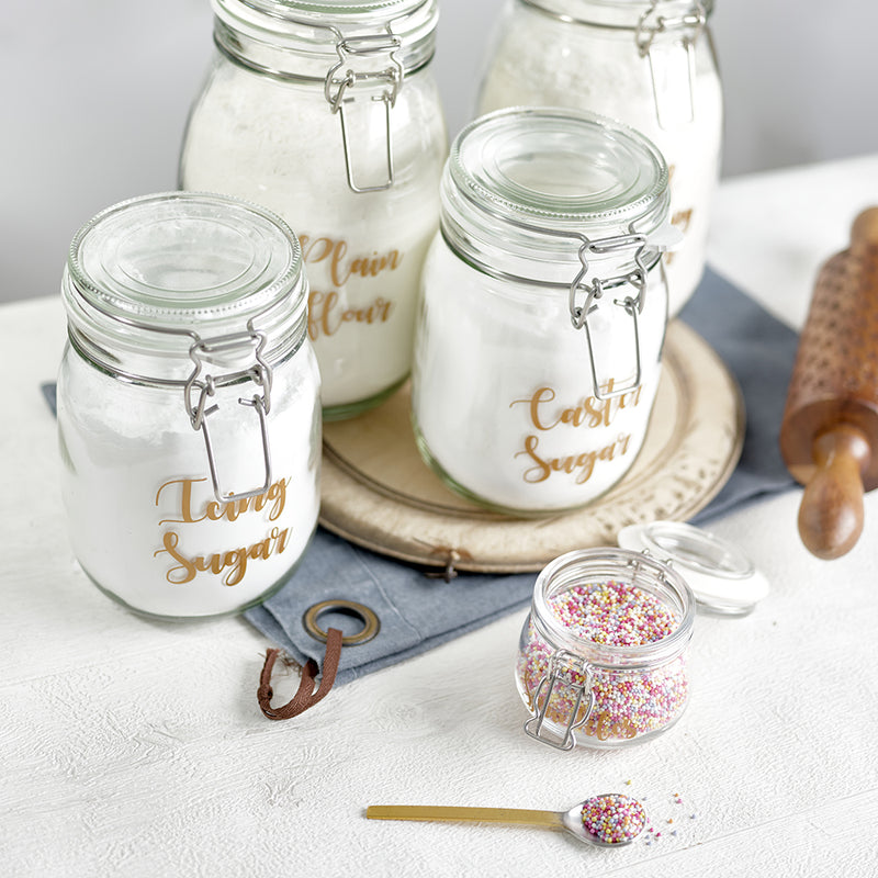 Glass clip top jar baking bundle for icing sugar, plain flour, caster sugar, self-rising flour, and a free sprinkle jar