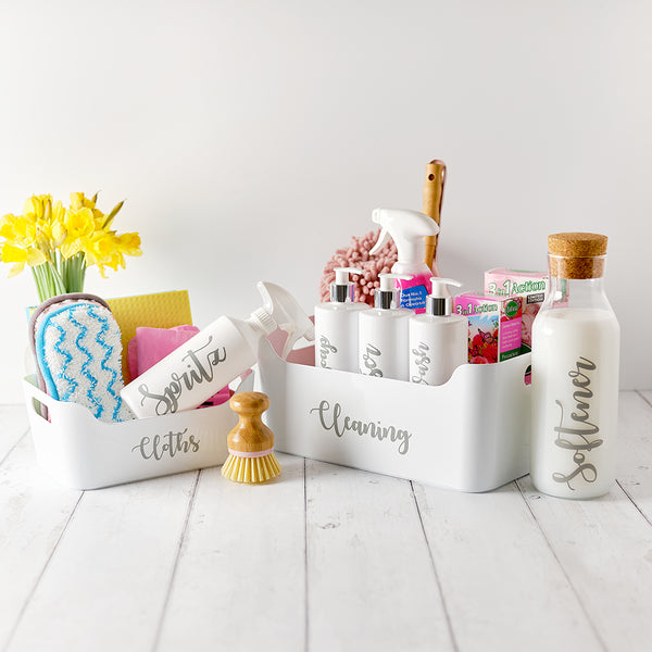 Small and large custom plastic storage boxes with custom personalised wording for cloths and cleaning supplies, for storing cleaning utensils and supplies.